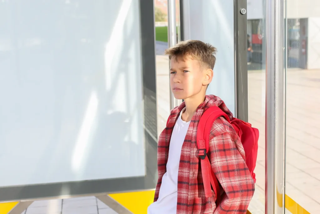 Child looking sad or frustrated not wanting to be at school